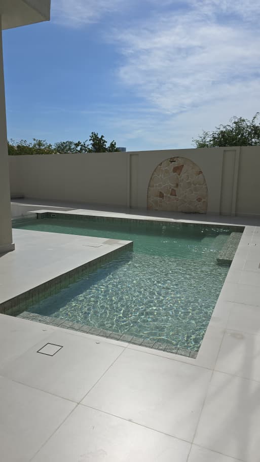 Finished tiled composite pool: premium surface experience with a prefabricated composite structure beneath.