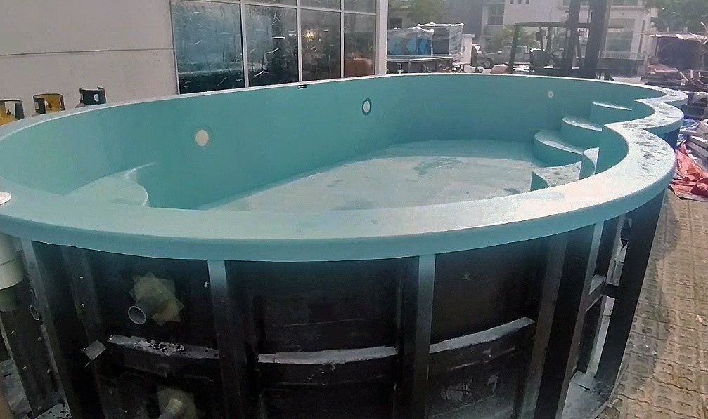 The engineered external support structure forms part of the Hydro One® prefabricated composite pool system, allowing the surrounding architectural deck and finishes to be completed around it afterward.