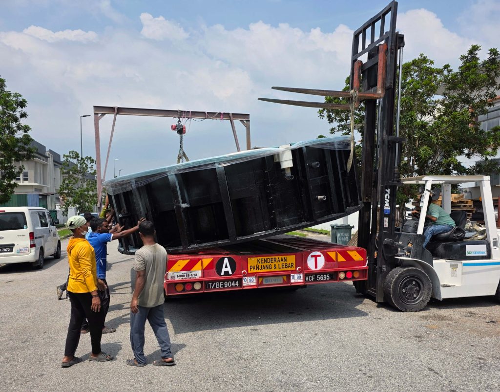 Hydro One® prefabricated swimming pool transported from factory for project installation in Kuala Lumpur.